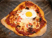 Ricetta pizza Uova e Pancetta Foto